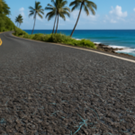 Ilustracja hero przedstawia A Hawaiian coastal road resurfaced w minimalistycznej, klarownej formie redakcyjnej.